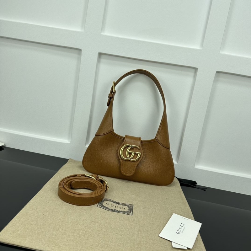 G*u*i top handle bags